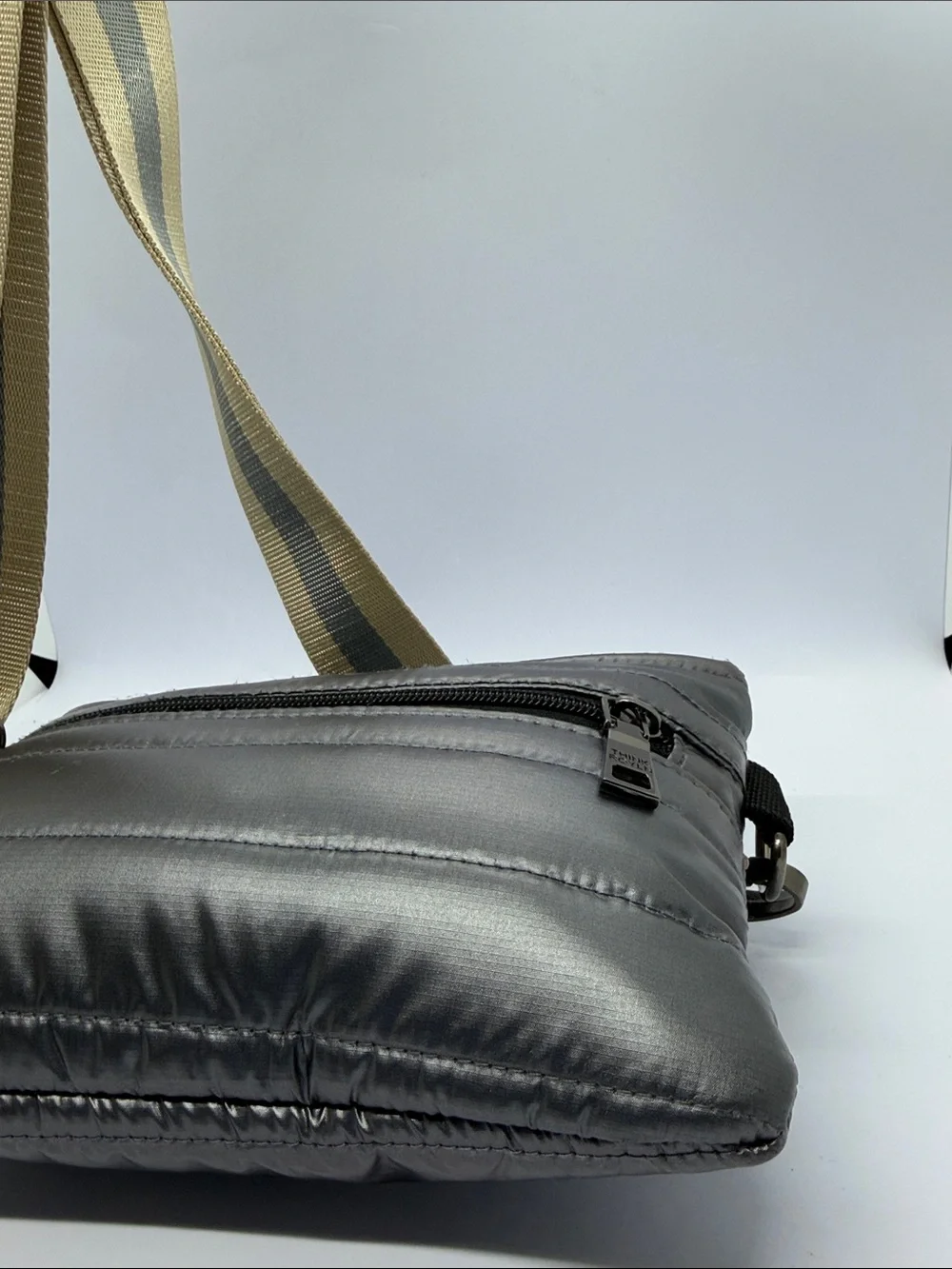 THINK ROYLN Gray Quilted Messenger Bag with Striped Tan Strap